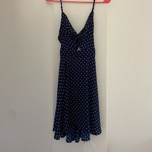 Dark blue polka dot dress with tie strap in back